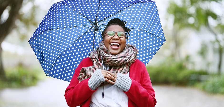 2021_eriesenseblog-umberllacoverage-large-1 woman holding an umbrella